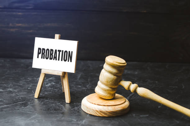 a small easel displays the word "probation" next to a gavel